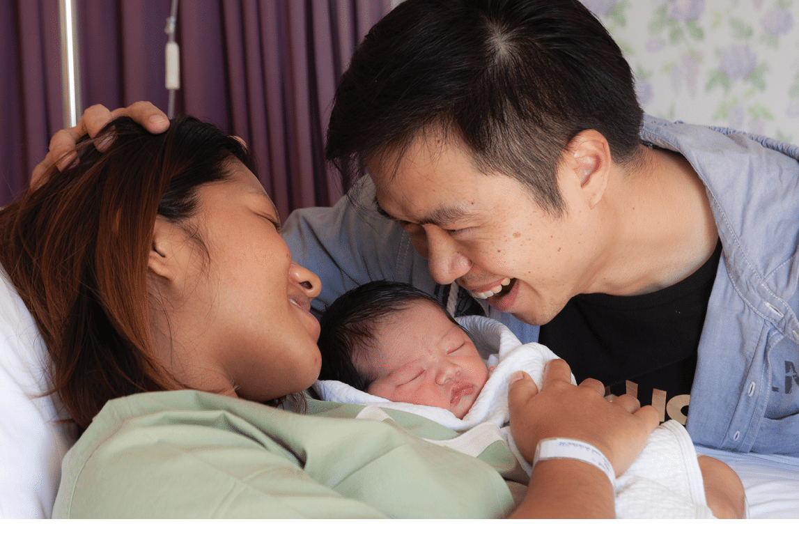 Mother and kid in the holding within the hospital