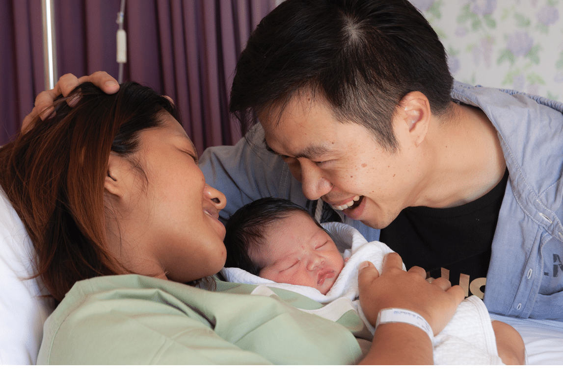 Mother and kid in the holding within the hospital